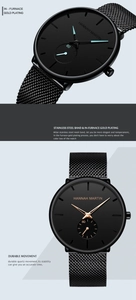 Detail view of quartz watch with black Milanese strap and luminous blue hands