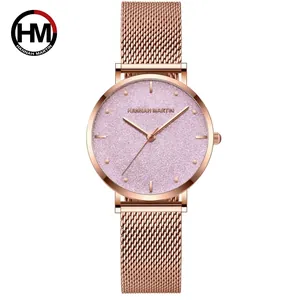 Montre Hannah Martin en maille d'or rose avec un cadran étoilé scintillant rose pour femme