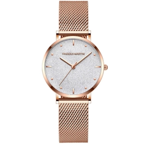 Montre femme à quartz or rose avec cadran ciel étoilé et bracelet en maille d'acier élégant