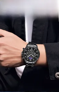 Detail view of black stainless steel chronograph watch with moon phase and diamond bezel