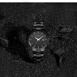 Macro shot of Hannah Martin quartz watch with black steel strap on textured stone background