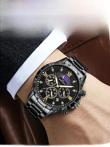 Close-up of black quartz watch face with golden Roman numerals and functional sub-dials