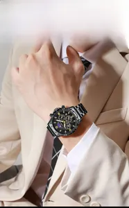 Close-up of a men's business quartz watch with black stainless steel and gold Roman numerals
