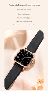 Detail of elegant square rose gold watch with black leather strap and Roman numerals