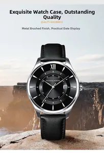 Macro detail of the silver steel watch case and black leather strap on a rugged rock