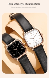 Detailed macro view of square rose gold watch faces with Roman numerals and leather straps