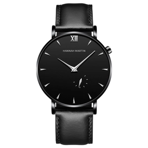 Minimalist black business watch with leather strap and silver Roman numeral XII markers