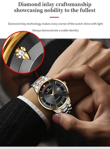 Detail showing the elegant diamond marker and date window on the black and gold watch dial