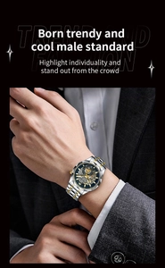 Detail of a men's luxury skeleton watch with two-tone steel strap on a male wrist