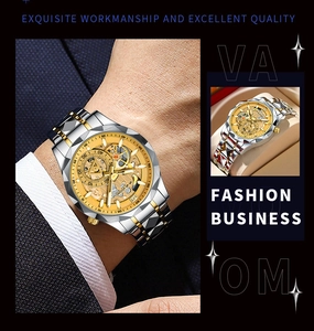 Detailed macro view of business watch with mechanical skeleton dial and steel strap