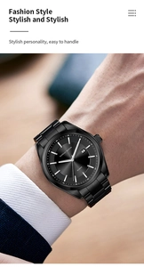 Detailed macro view of black stainless steel strap and sunray dial on men's quartz watch