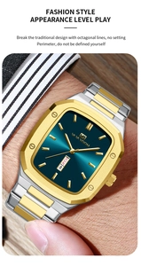 Close-up of a silver and gold steel watch with octagonal bezel and dual date display