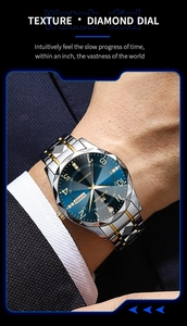 Macro shot of the blue sunray dial with diamond markers and faceted steel bezel
