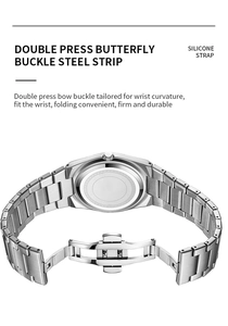 Détail du dos de la montre en acier argenté et boucle papillon sur bracelet métallique