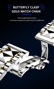 Luxury silver and gold watch band detail with butterfly clasp and pyramid links