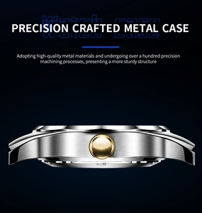 Detail view of silver brushed metal watch case with gold knurled crown and precise finish