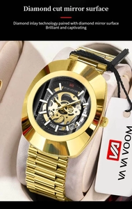 Detail of gold automatic watch featuring a diamond-cut crystal and skeleton dial
