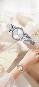 Close-up of elegant Hannah Martin quartz watch with a unique snake-textured metal band