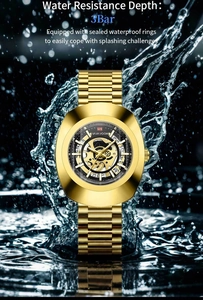 Macro view of gold stainless steel watch showing 3Bar water resistance and mechanical gears