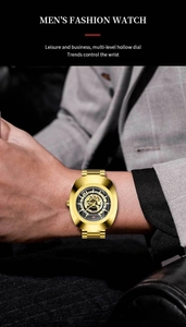 Macro shot of men's gold stainless steel skeleton watch with oval bezel and metal band