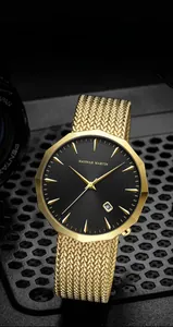 Detail of gold polygonal watch case with black dial and date window on mesh band
