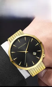 Detailed close-up of golden octagonal watch case with black dial on a man wrist
