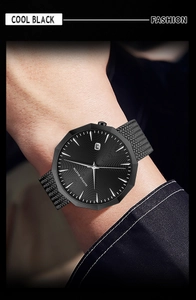 Close-up of matte black octagonal men's watch with textured dial and silver markers