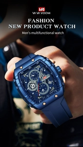 Detail view of the multifunctional blue quartz watch dial with chronograph sub-dials