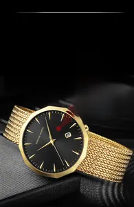 Detail of gold mesh strap watch with black rippled dial and calendar function