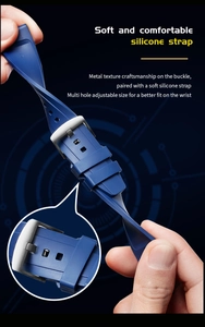 Detail view showing the flexible blue silicone watch strap and durable metal pin buckle