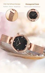 Detail of rose gold hexagonal watch with black wave dial on shell and pearl background