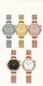 Detail view of hexagonal minimalist ladies watches with wavy dial patterns and mesh bands