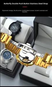 Detail of gold and silver stainless steel watch strap with double push-button butterfly clasp