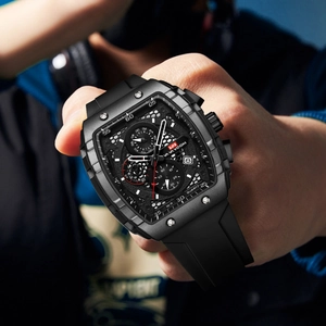 Men's tonneau quartz watch with black matte case and skeleton dial on silicone strap