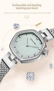 Detail of slim hexagonal watch with green ripple dial and silver mesh strap