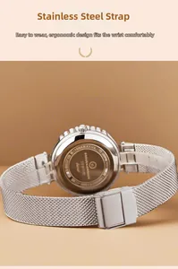 Close-up of polished stainless steel watch back and adjustable Milanese mesh silver band