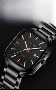Macro side view of square black stainless steel watch case with rose gold markers