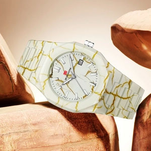 Fashionable marble pattern quartz watch for women with date display and gold accents