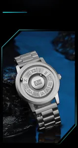 Macro shot of futuristic magnetic ball watch with roman numerals on silver metal dial