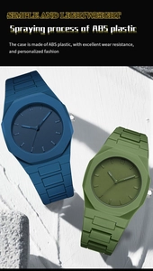 Close-up of minimalist blue and olive green quartz watches with durable silicone straps