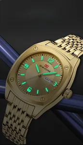Detail view of business quartz watch with luminous markers and double calendar display