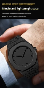 Detail of a black octagonal quartz watch with Arabic numerals and a silicone strap