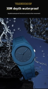 Detail of 30M waterproof navy blue sports watch with octagonal bezel in splashing water