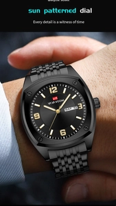 Detail of tonneau-shaped business watch with dual calendar display and black metal strap