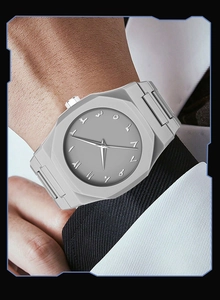 Detail of minimalist octagonal watch with grey matte finish and Arabic numerals dial
