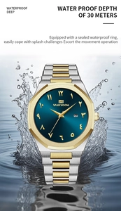 Close-up of waterproof gold and silver watch with Arabic dial and blue face splash water