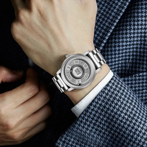 Men's magnetic suspension watch with silver steel beads and Roman numeral dial on wrist
