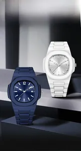 Detail of nautical-style sports watches in blue and white featuring octagonal bezels