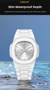 Close-up of white waterproof sports watch showing 30m water resistance and date window