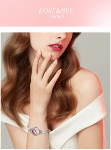 Détails de la montre bracelet argentée pour femme avec cadran rose et cristaux brillants